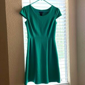 Green dress. Brand:Enfocus Studio.